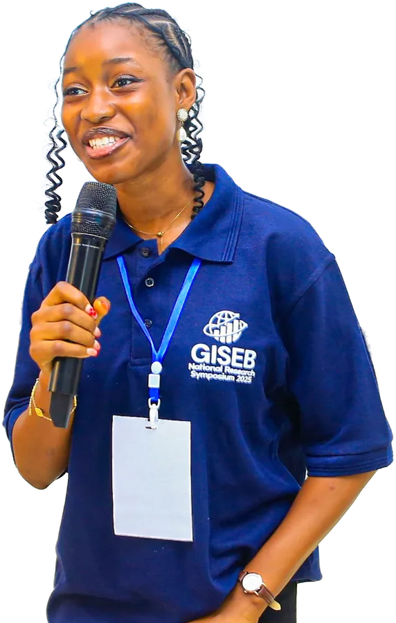A student presenting with a microphone at the GISEB National Research Symposium 2025